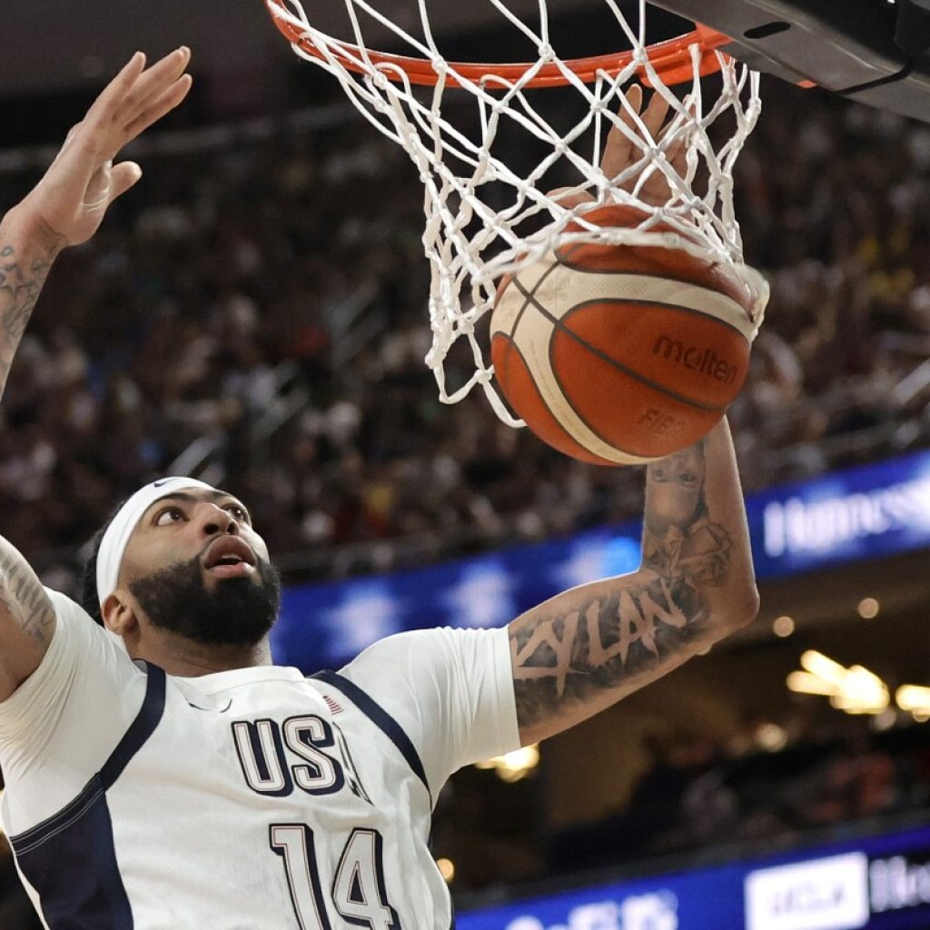 US wastes most of big lead, holds on to beat Australia 98-92 in tuneup for Paris Olympics