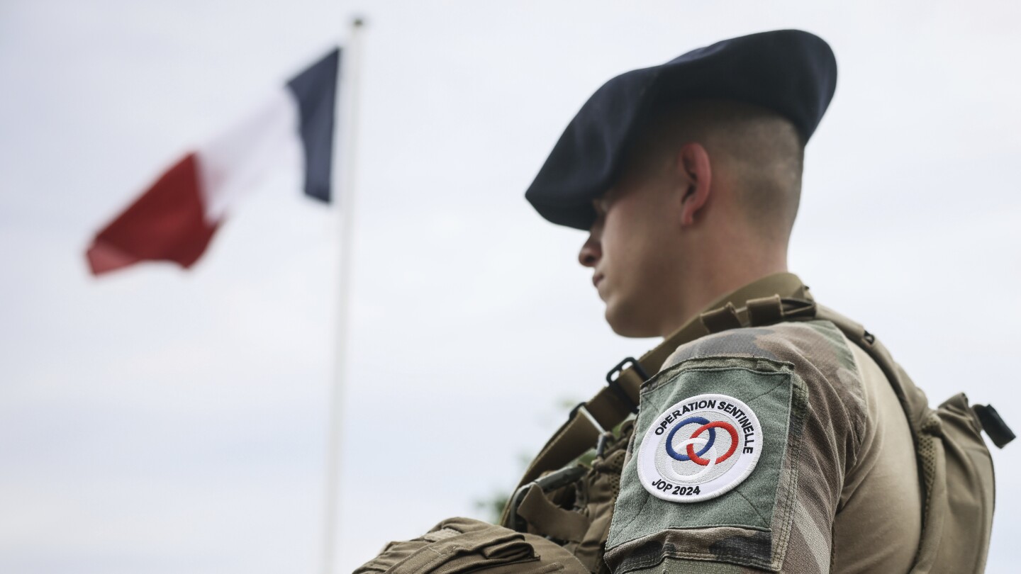 Attacker stabs and wounds French soldier patrolling Paris ahead of the 2024 Olympics