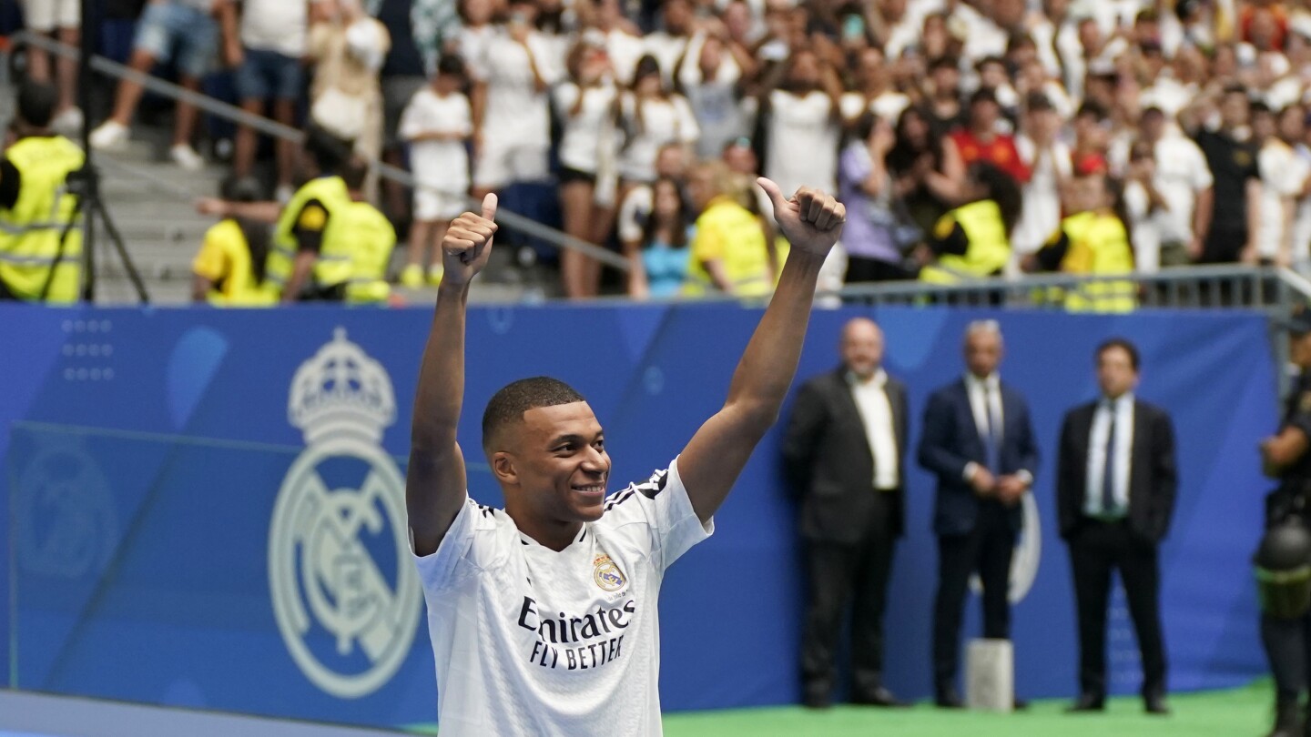 On ‘incredible day,’ Kylian Mbappé welcomed by Real Madrid fans at packed Santiago Bernabeu Stadium