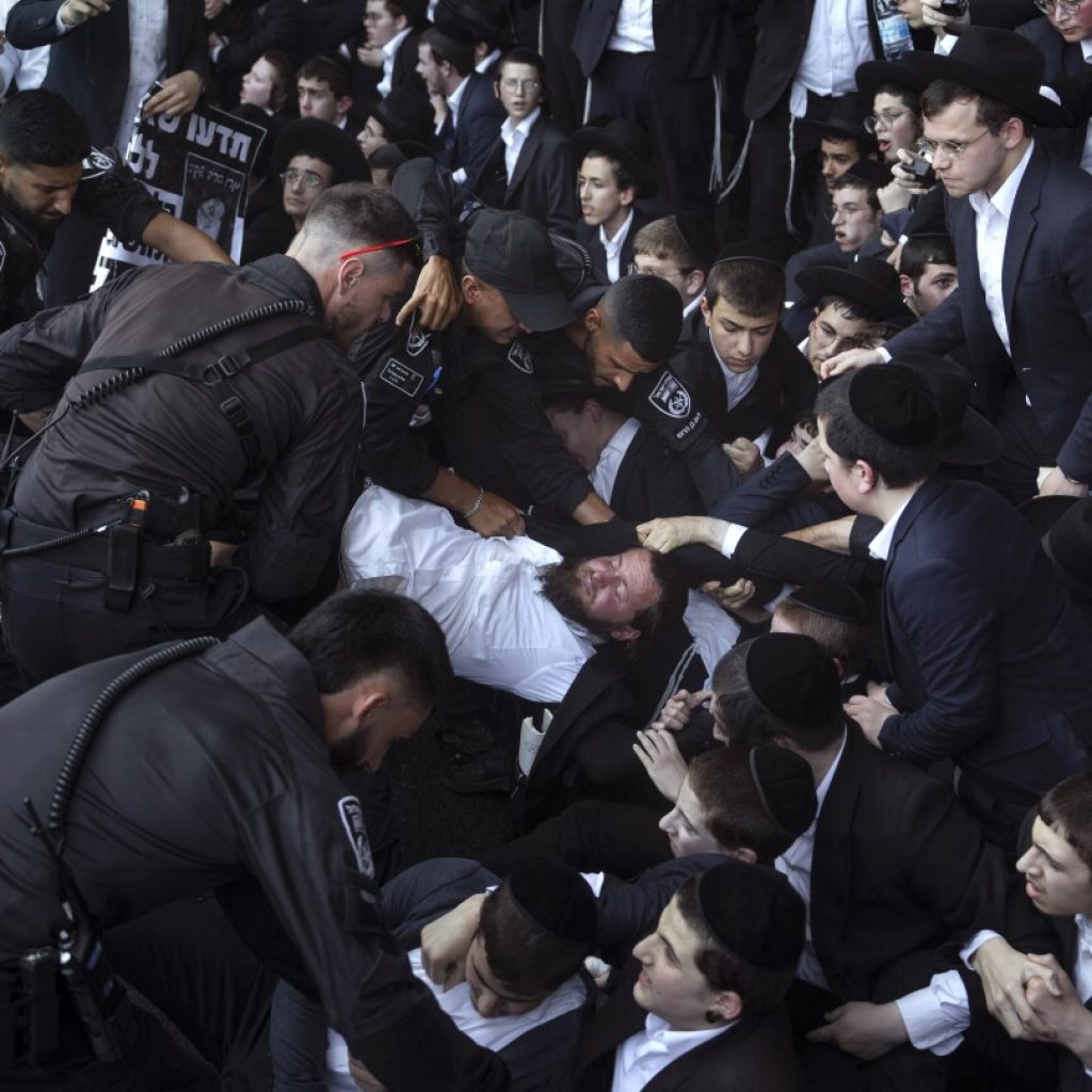 Israeli military says it will begin drafting ultra-Orthodox men. That could rattle the government