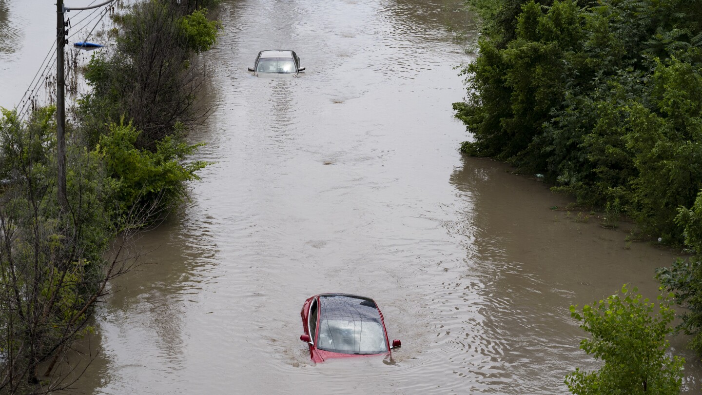 Water rescues underway in Arkansas after a new wave of storms across US and Canada