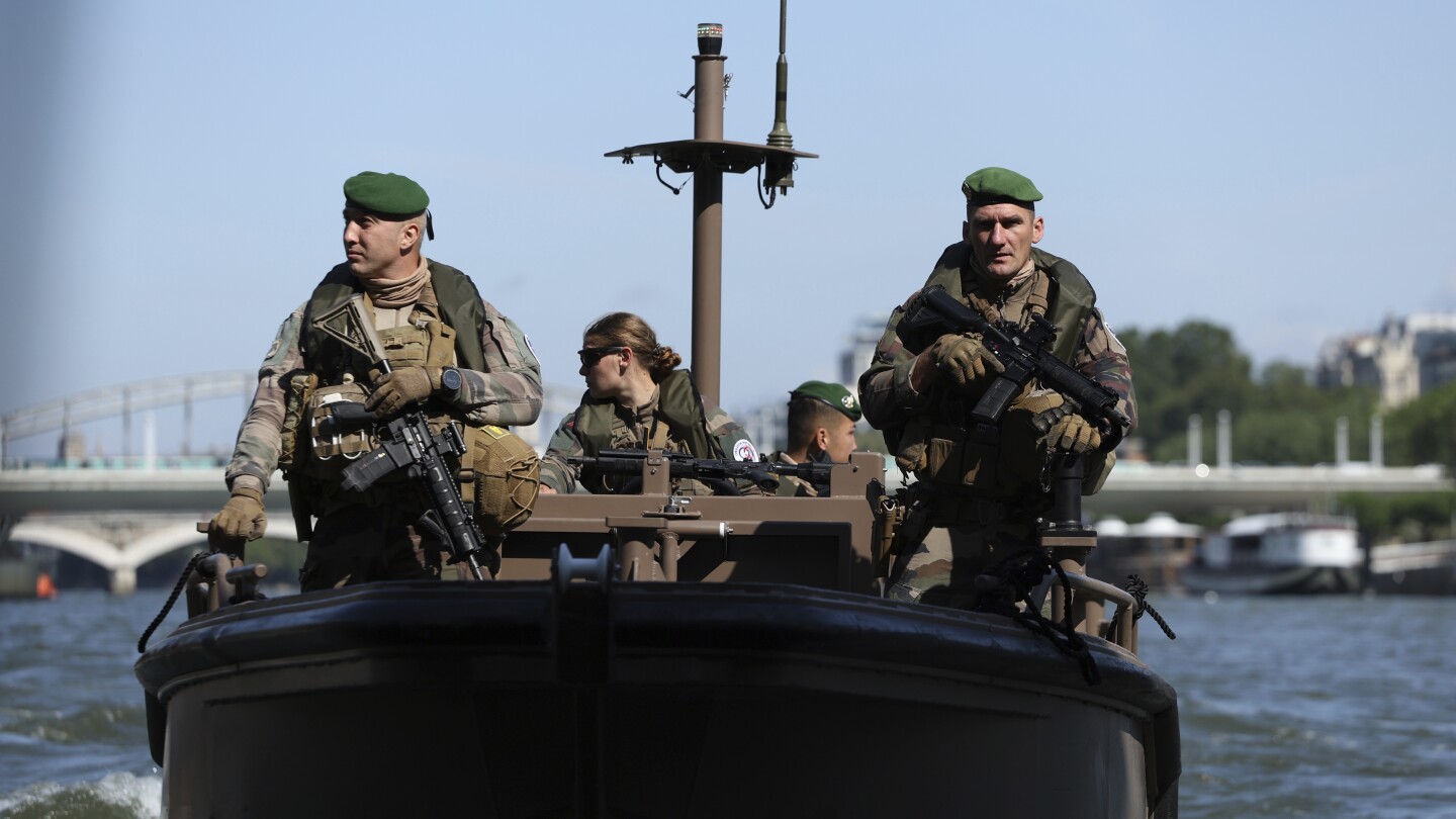 In and on the water, French troops secure the River Seine for the Paris Olympics opening ceremony