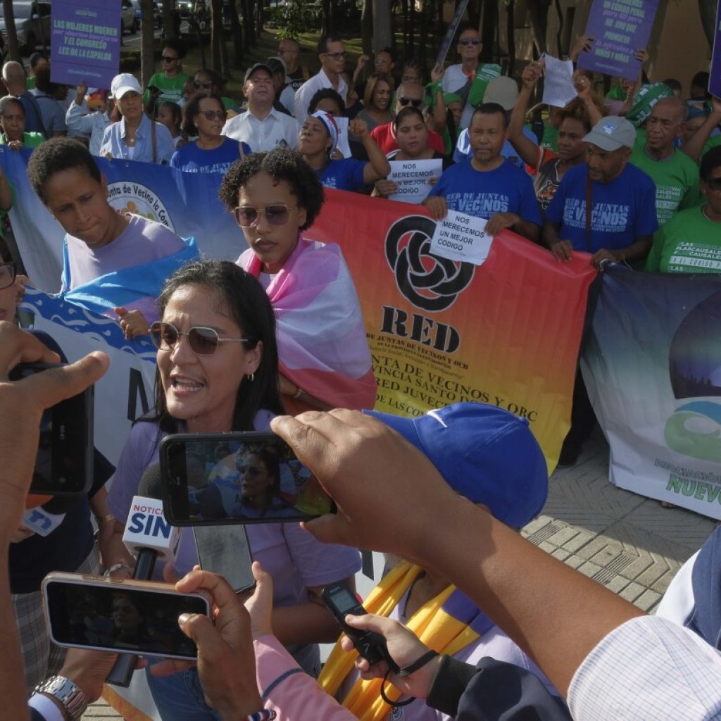 Dominican activists protest against a new criminal code that would maintain total abortion ban