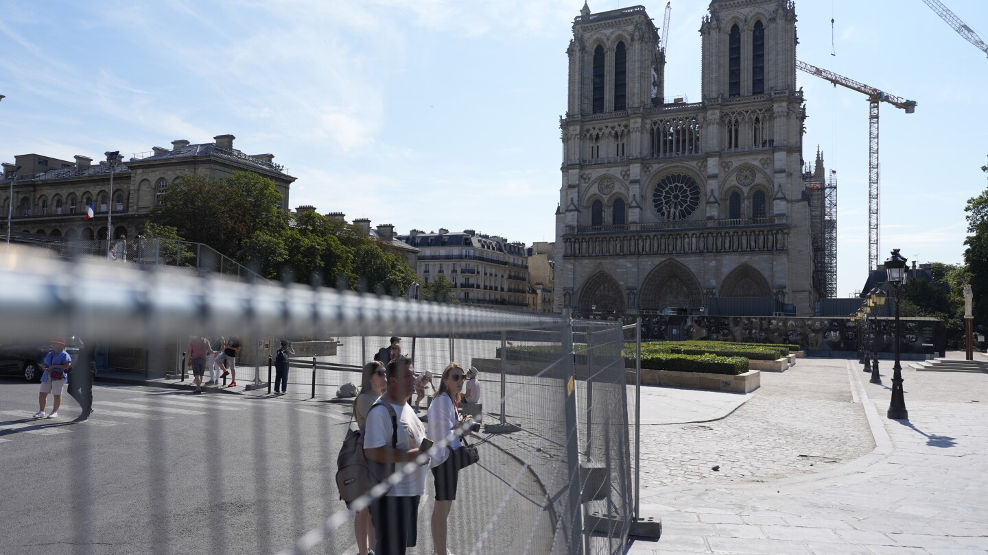 Paris police are sealing off the Seine River ahead of the Olympics opening ceremony