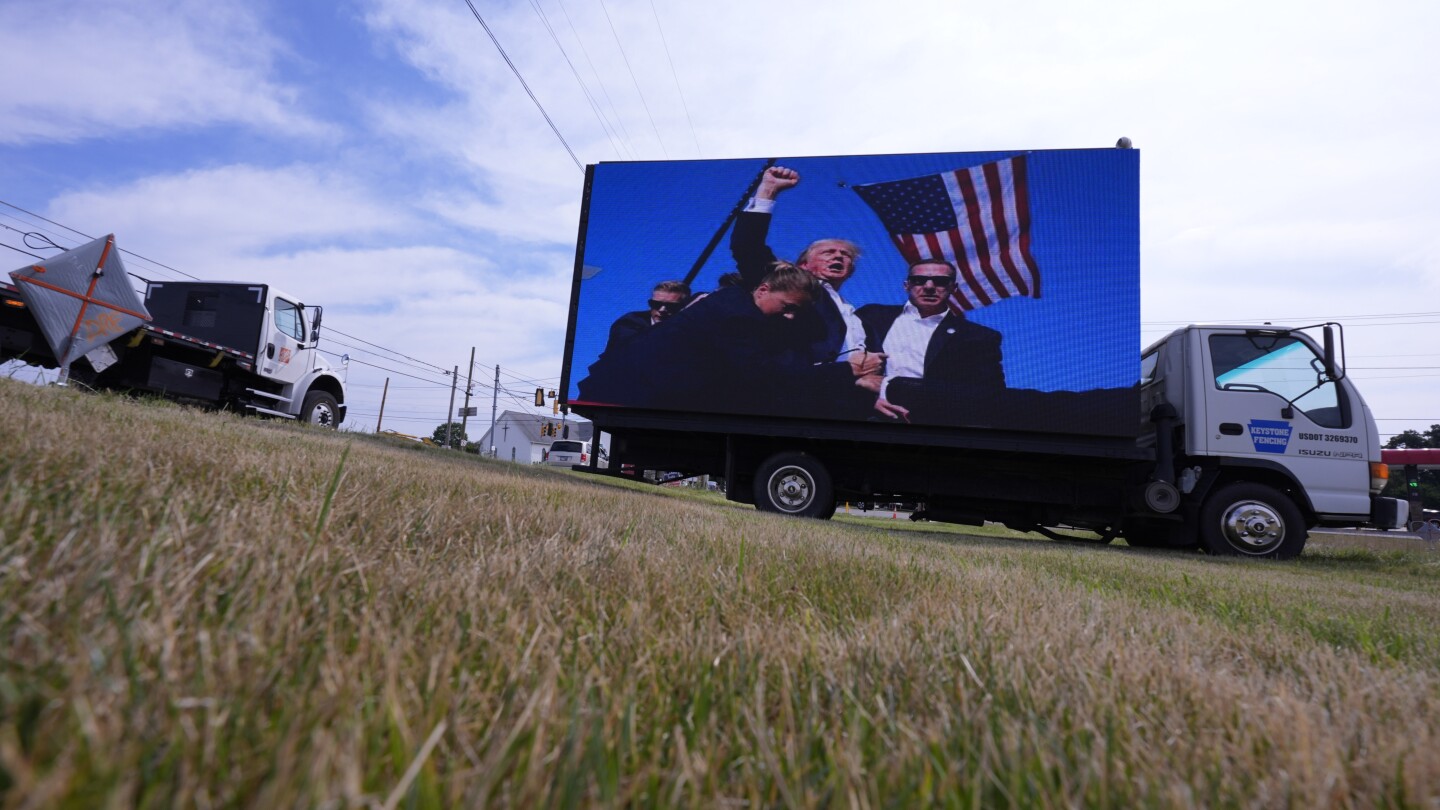 Rally shooter had photos of Trump, Biden and other US officials on his phone, AP sources say