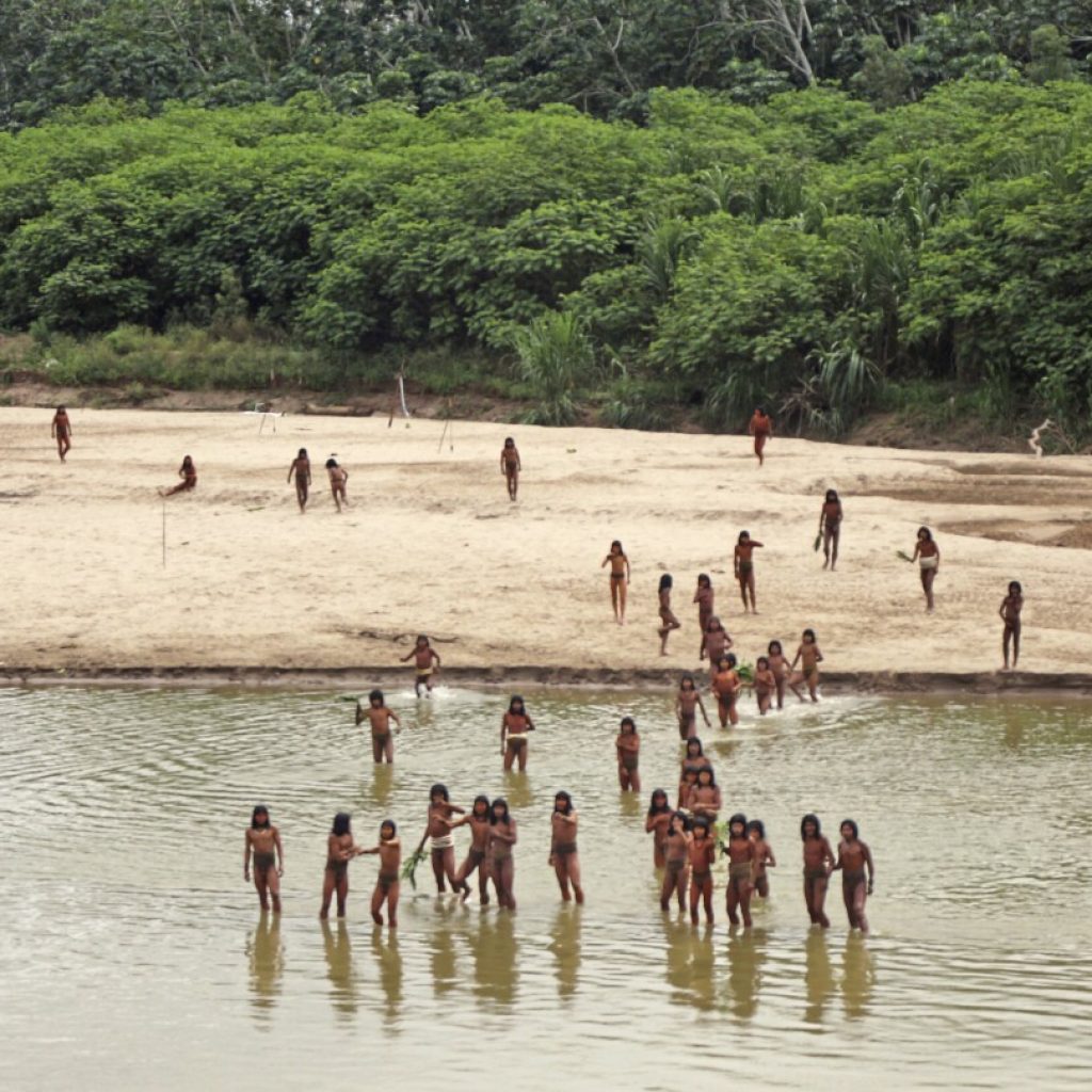 Group says photos of reclusive tribe on Peru beach show logging concessions are ‘dangerously close’