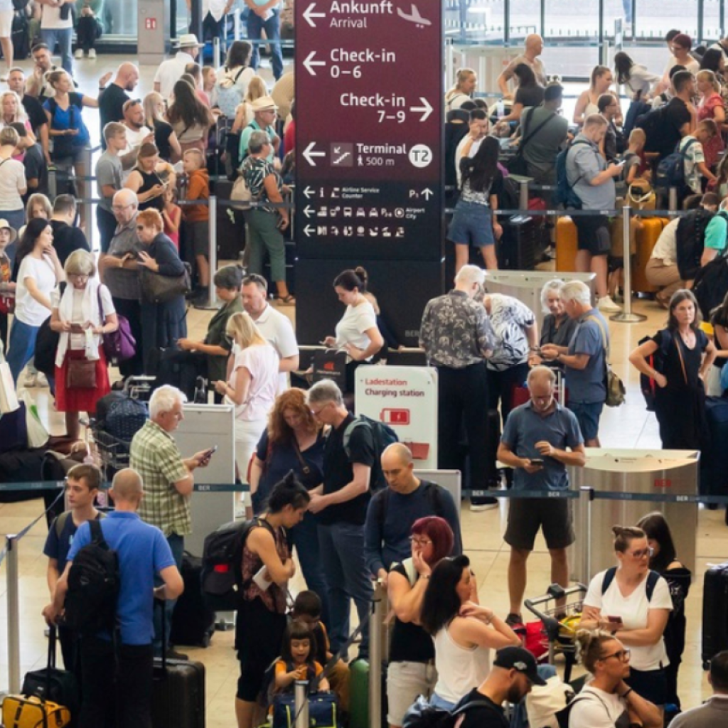 Flights delayed at Berlin airport as widespread technology outage causes disruption around world | AP News