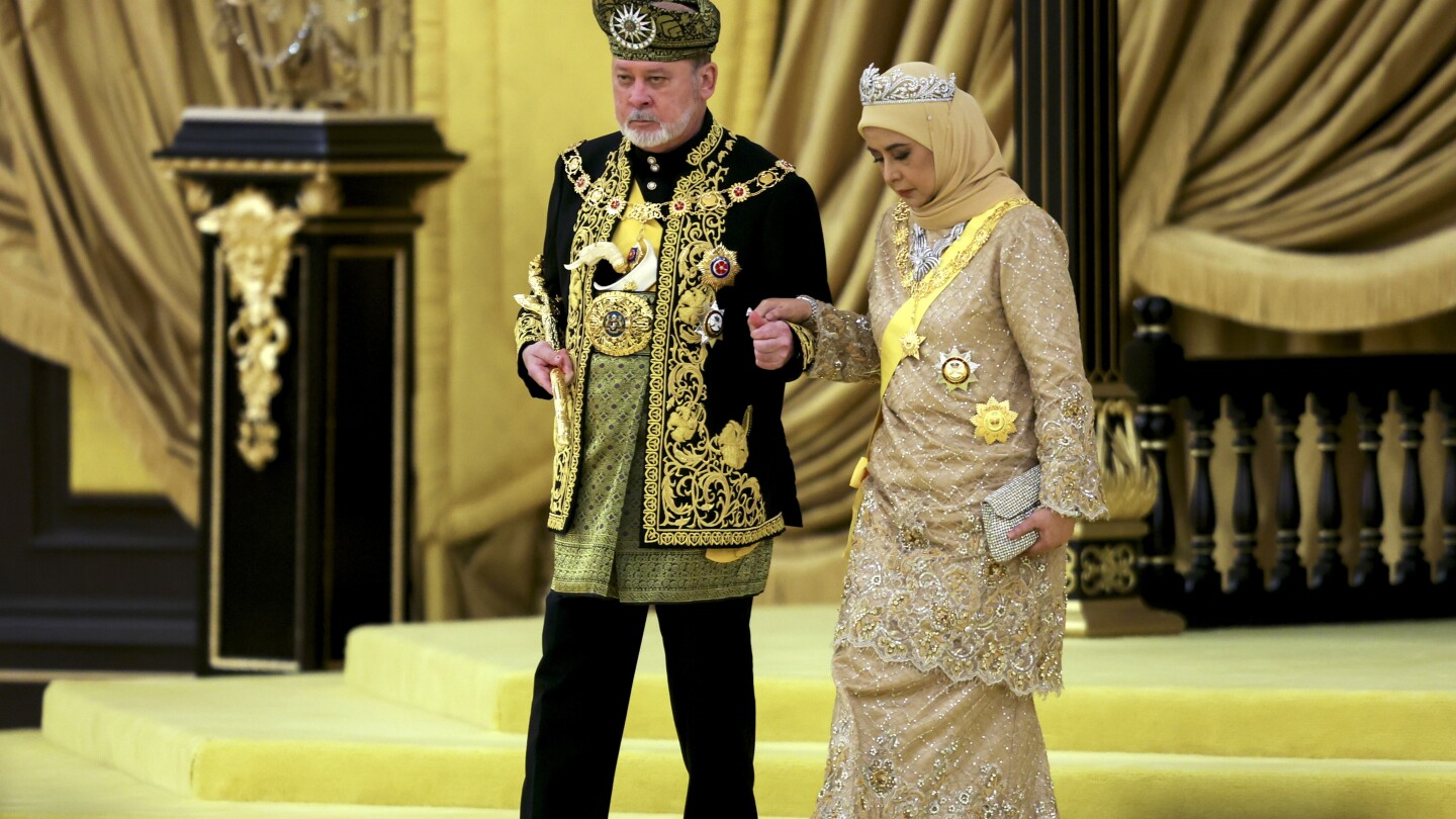 Malaysia honors a new king in coronation marked by pomp and cannon fire