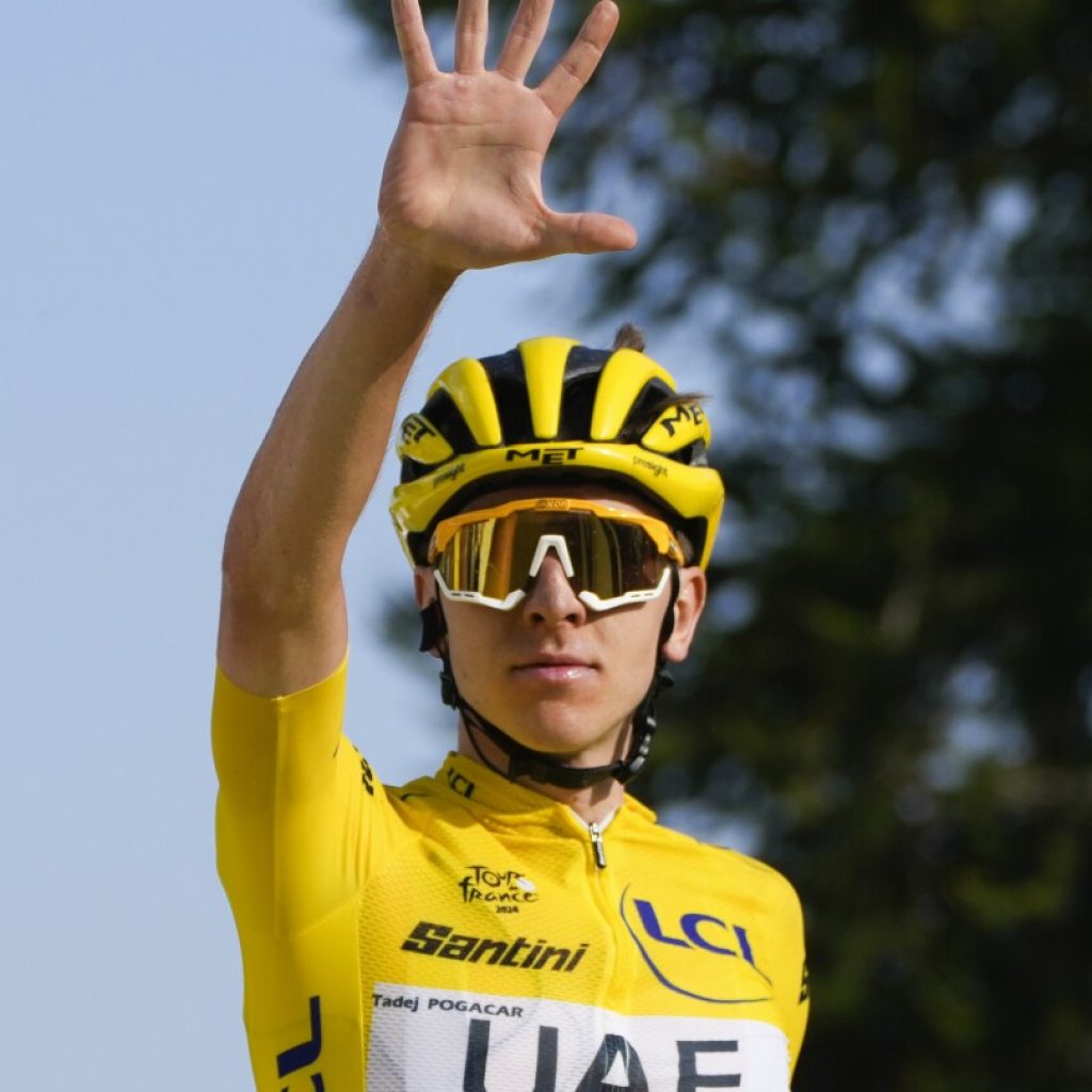 Pogacar edges Vingegaard to add more seconds to Tour de France lead and match a 76-year-old mark