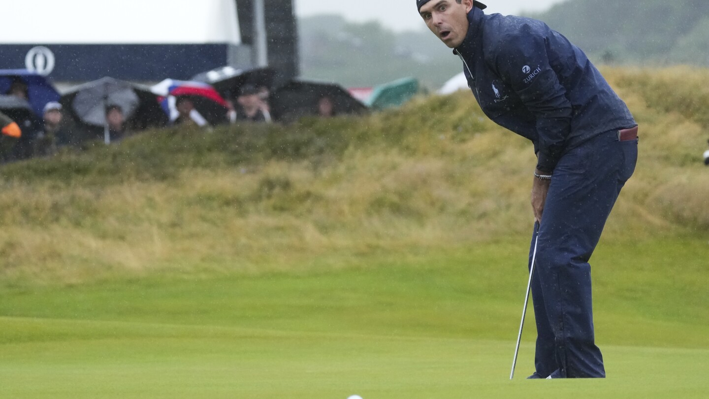 Horschel leads British Open on wild day of rain and big numbers at Royal Troon