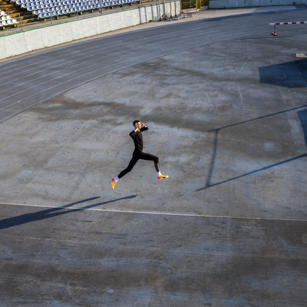 The loneliness of an Olympic athlete training in wartime Ukraine through an AP photographer’s lens