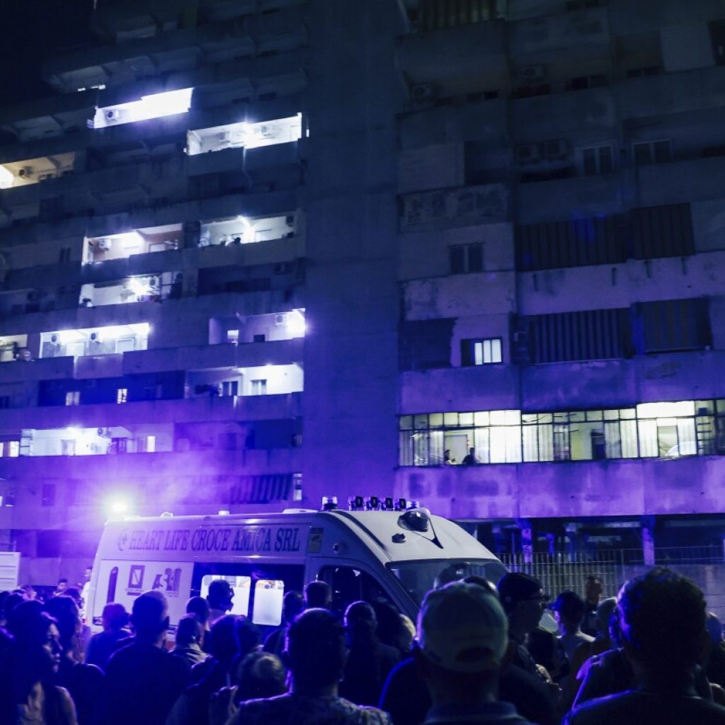 Walkway collapses in massive housing project in southern Italy, killing 2 and injuring a dozen