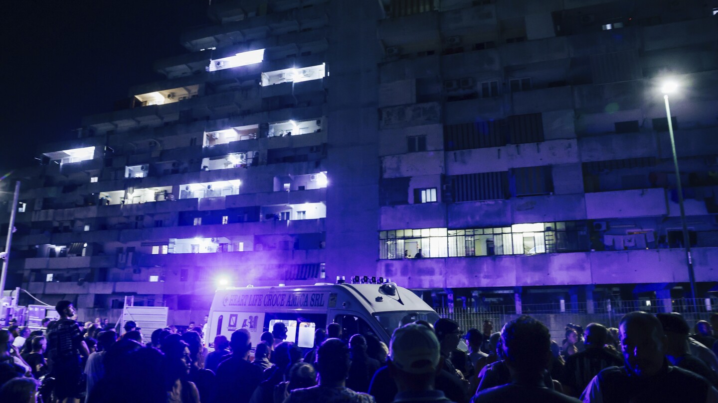 Walkway collapses in massive housing project in southern Italy, killing 2 and injuring a dozen