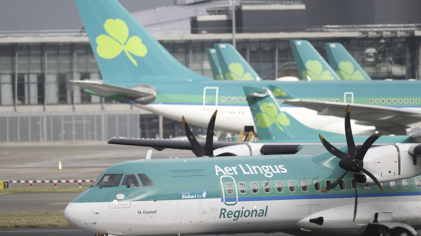 Aer Lingus pilots vote to accept a pay raise. It ends a dispute that canceled hundreds of flights