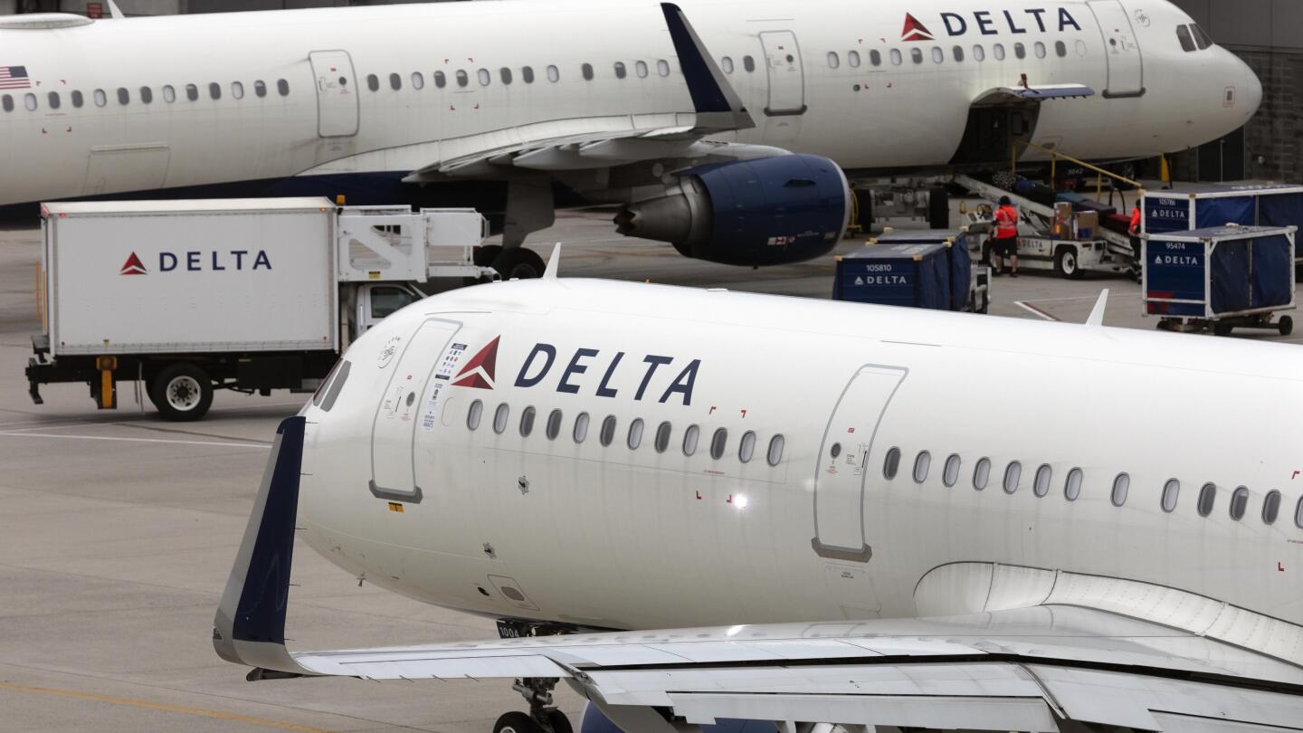 US is investigating Delta’s flight cancellations and faltering response to global tech outage