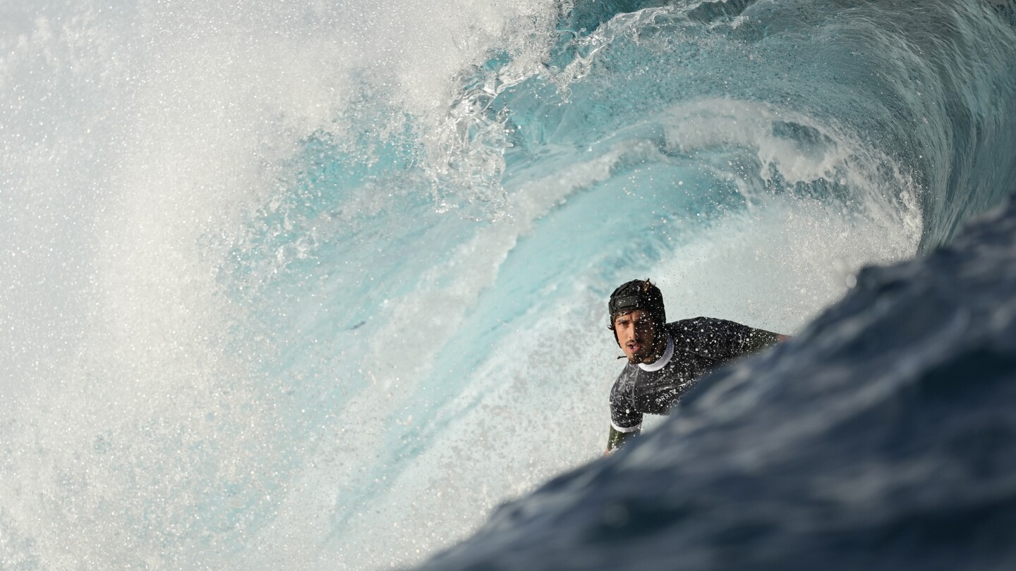 Surfers, staff and locals make final preparations in Tahiti before the Paris Olympics begin