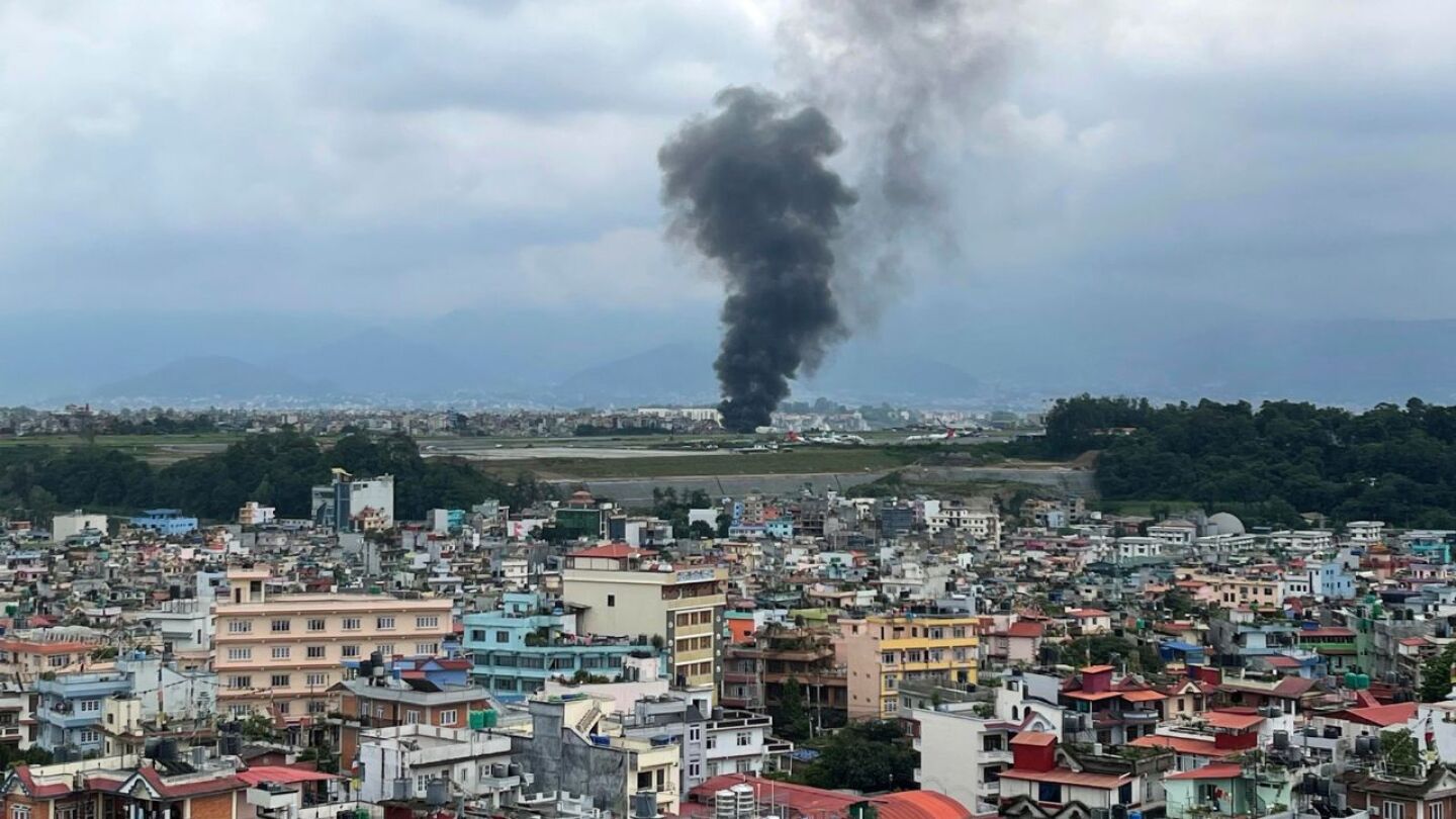 Plane slips off the runway and crashes in Nepal, killing 18 passengers and injuring the pilot | AP News