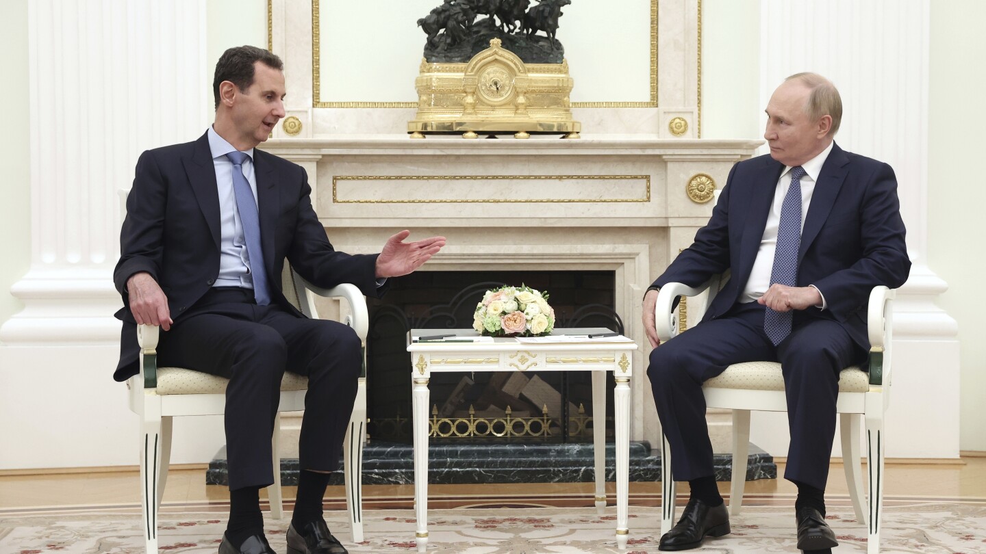 Russian President Vladimir Putin meets Syrian President Bashar Assad in the Kremlin