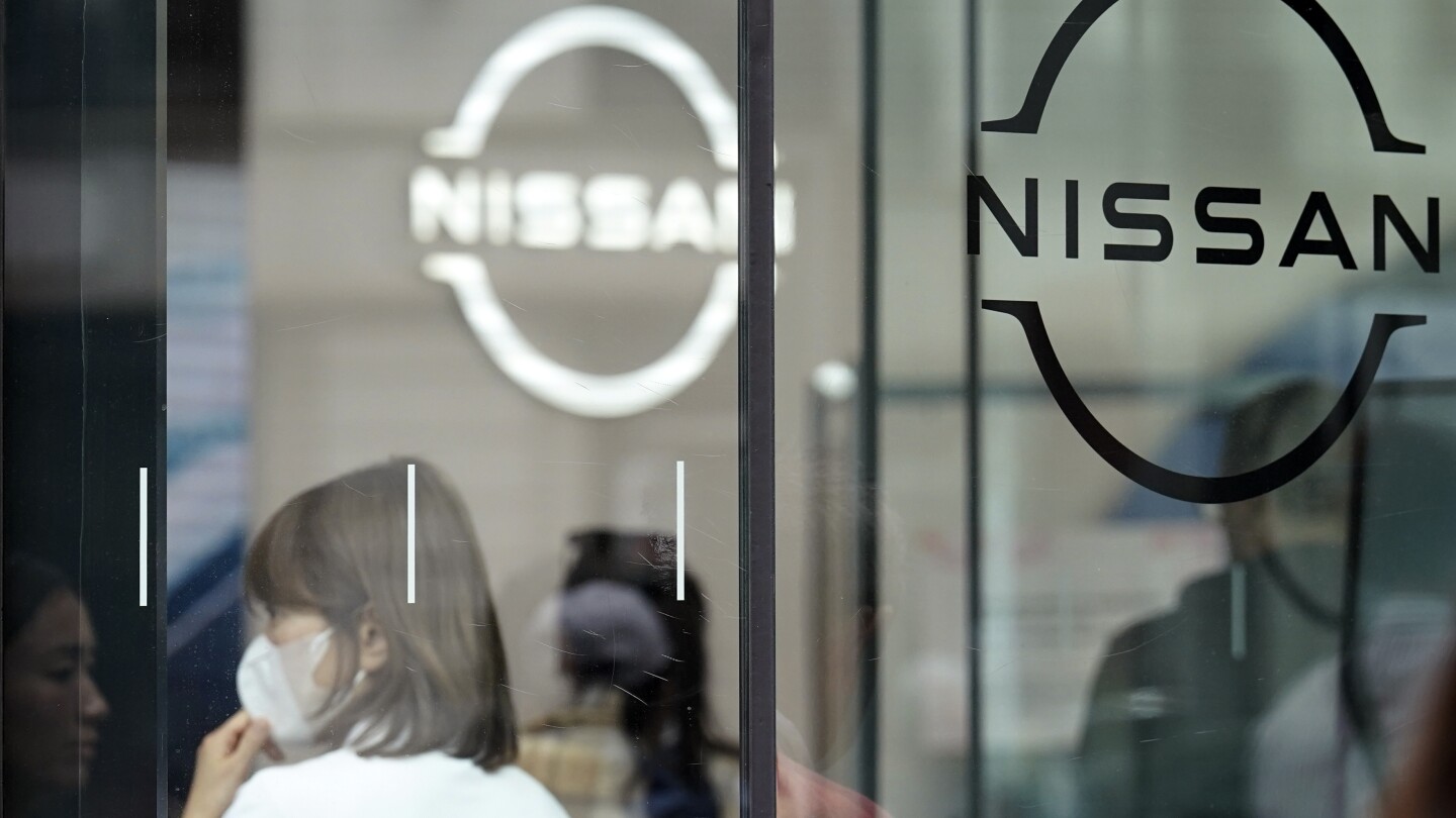 Japanese automaker Nissan lowers its profit forecast amid incentive, inventory woes