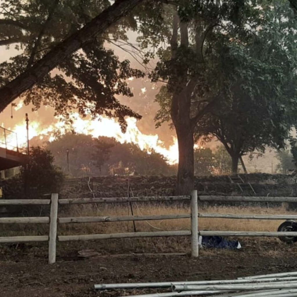 Wildfires prompt California evacuations as crews battle Oregon and Idaho fires stoked by lightning