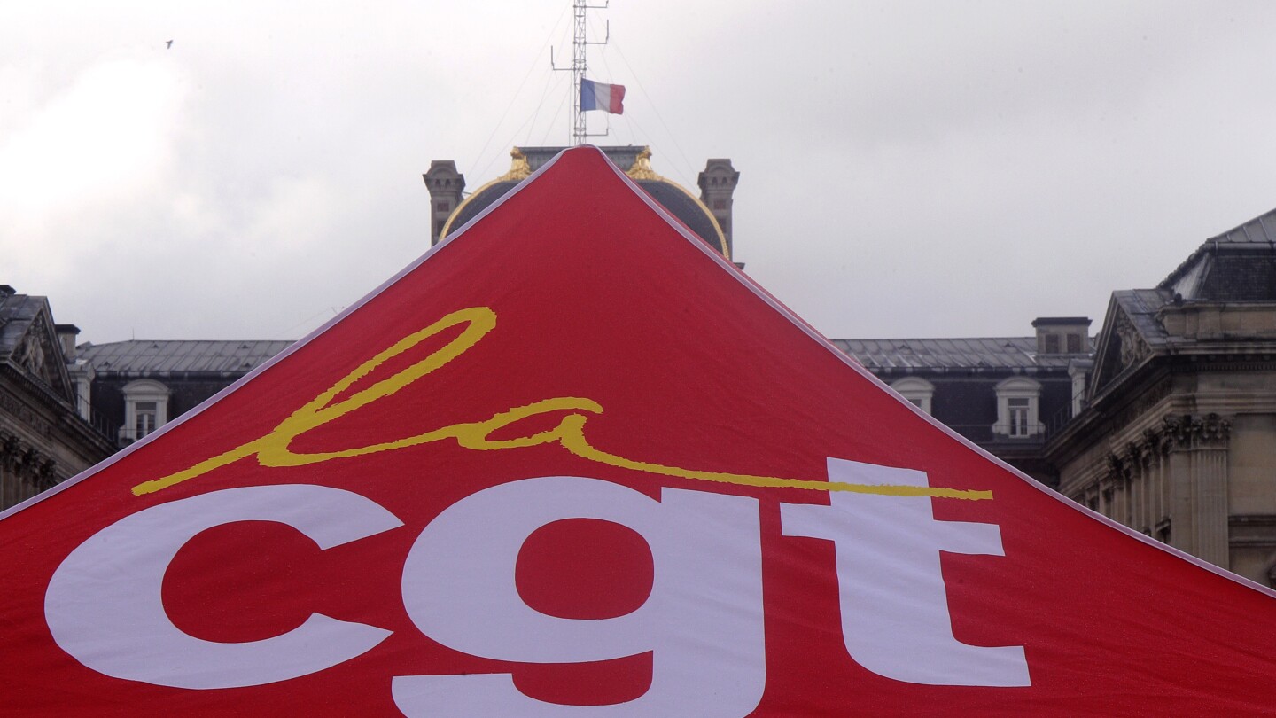 Workers go on strike at five-star Paris hotel where IOC members are staying for Olympics