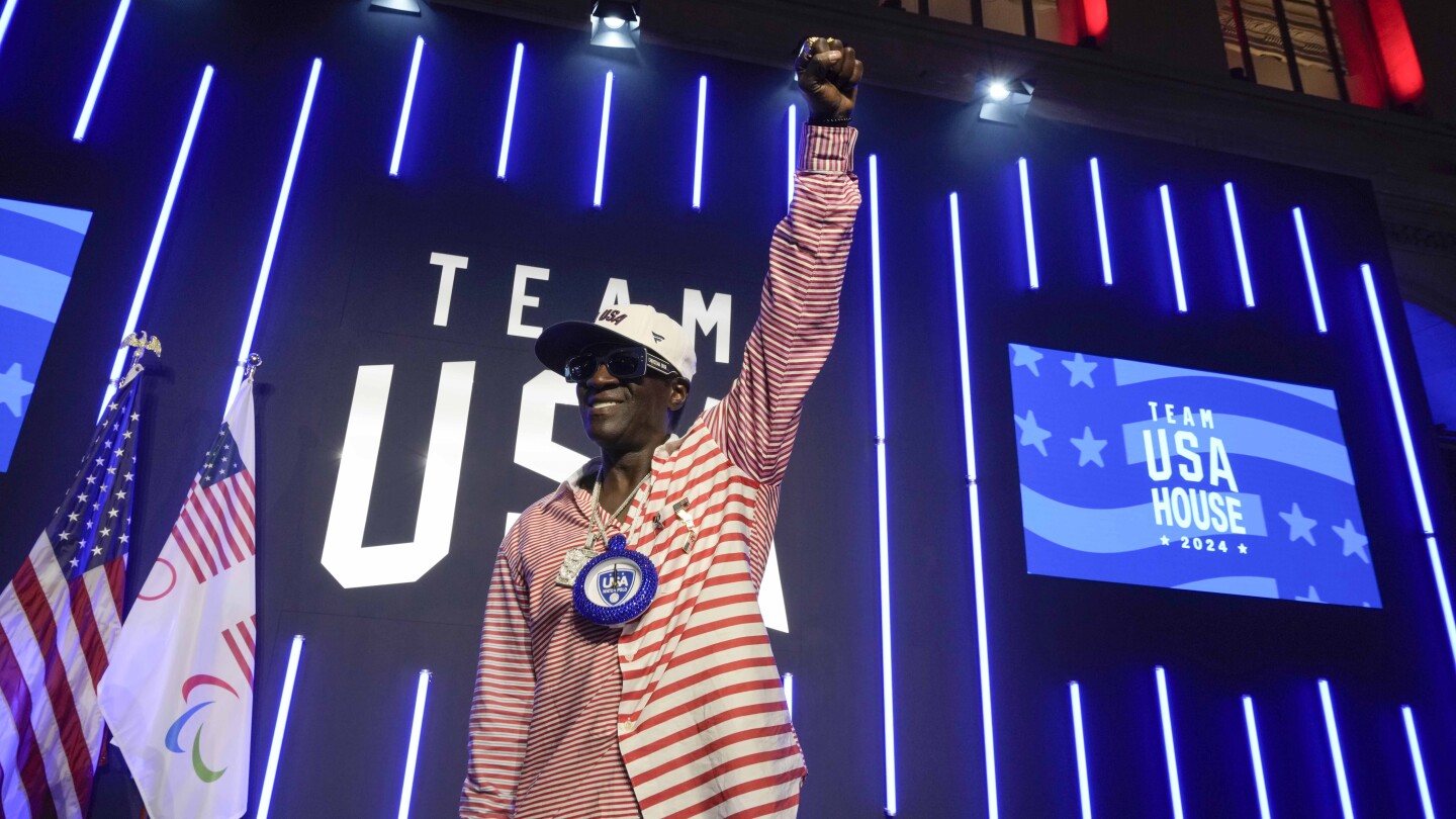 Flavor Flav is soaking up his 1st Olympic experience cheering on the US water polo teams