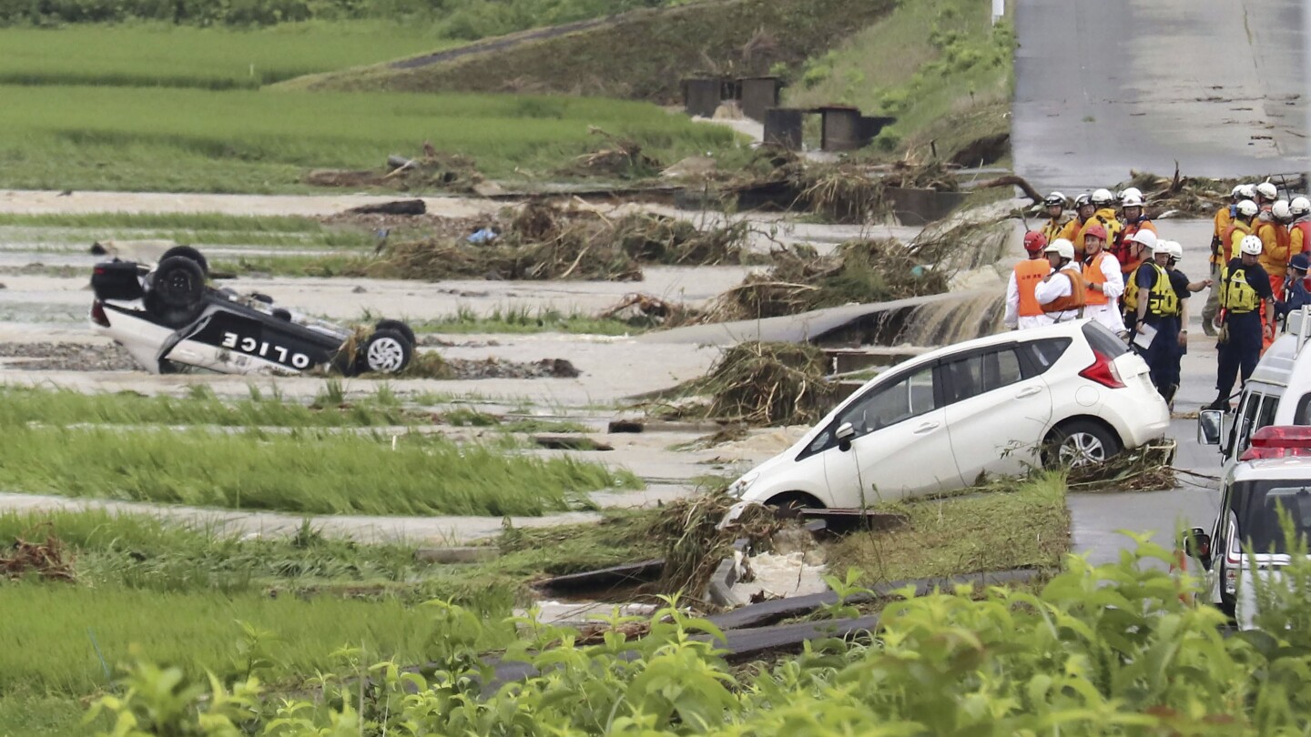 Heavy rain in northern Japan triggers floods and landslides, forcing hundreds to take shelter