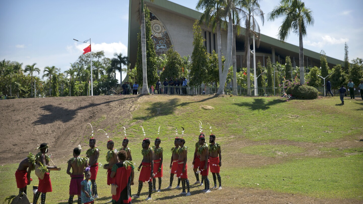 Gang kills at least 26 villagers in remote Papua New Guinea, officials say