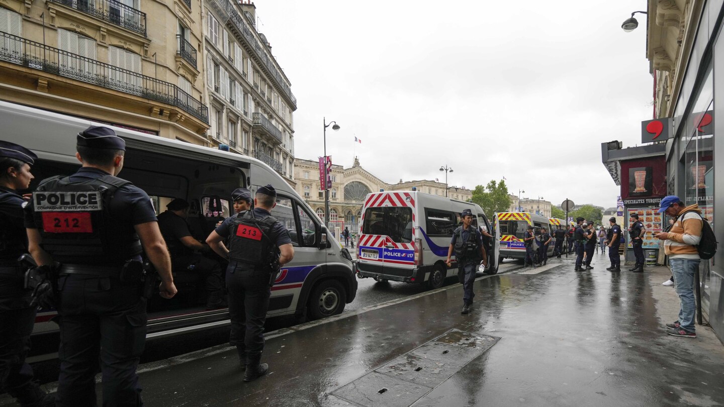 Sabotaged trains and forecast rain get Paris Olympics off to a rougher than hoped-for start