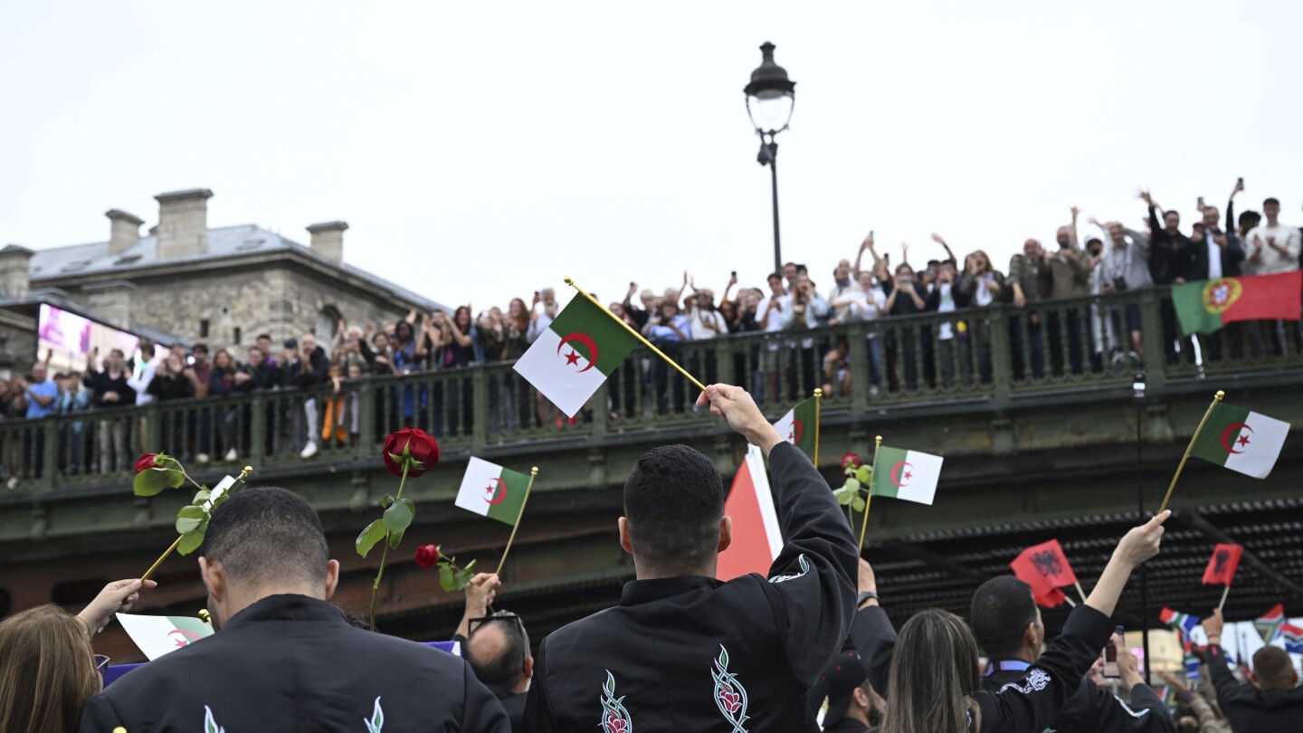 Algerians honor victims of colonial-era French crackdown at Paris Olympics ceremony