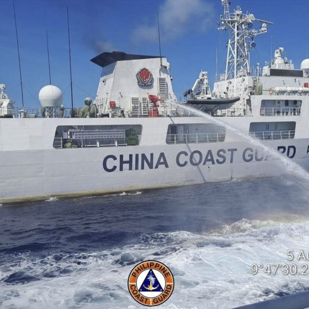 The Philippines says its forces sailed to hotly disputed shoal guarded by China without any clashes