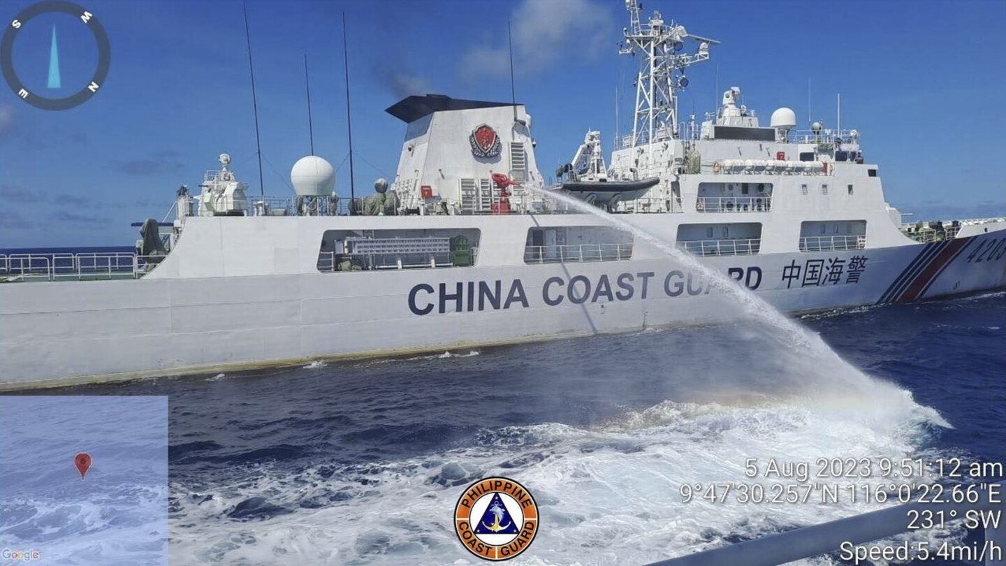 The Philippines says its forces sailed to hotly disputed shoal guarded by China without any clashes