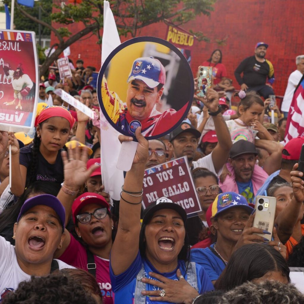 AP PHOTOS: Venezuelans rally ahead of election many see as biggest threat yet for President Maduro