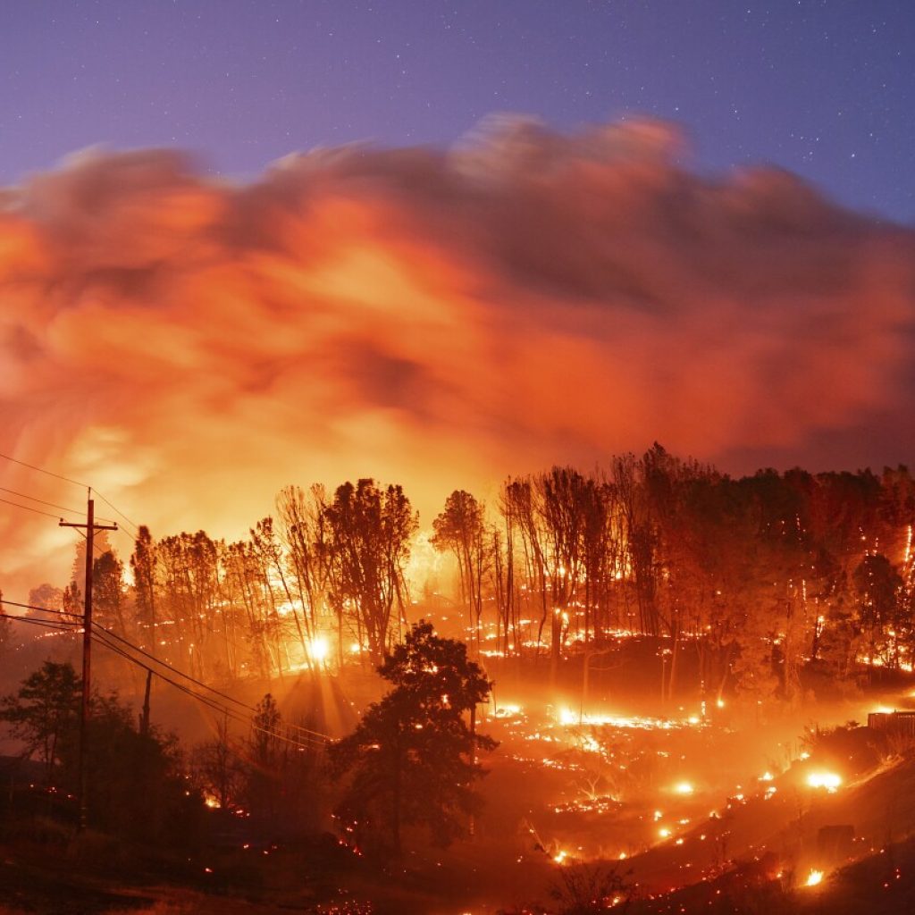 California’s largest wildfire explodes in size as fires rage across US West