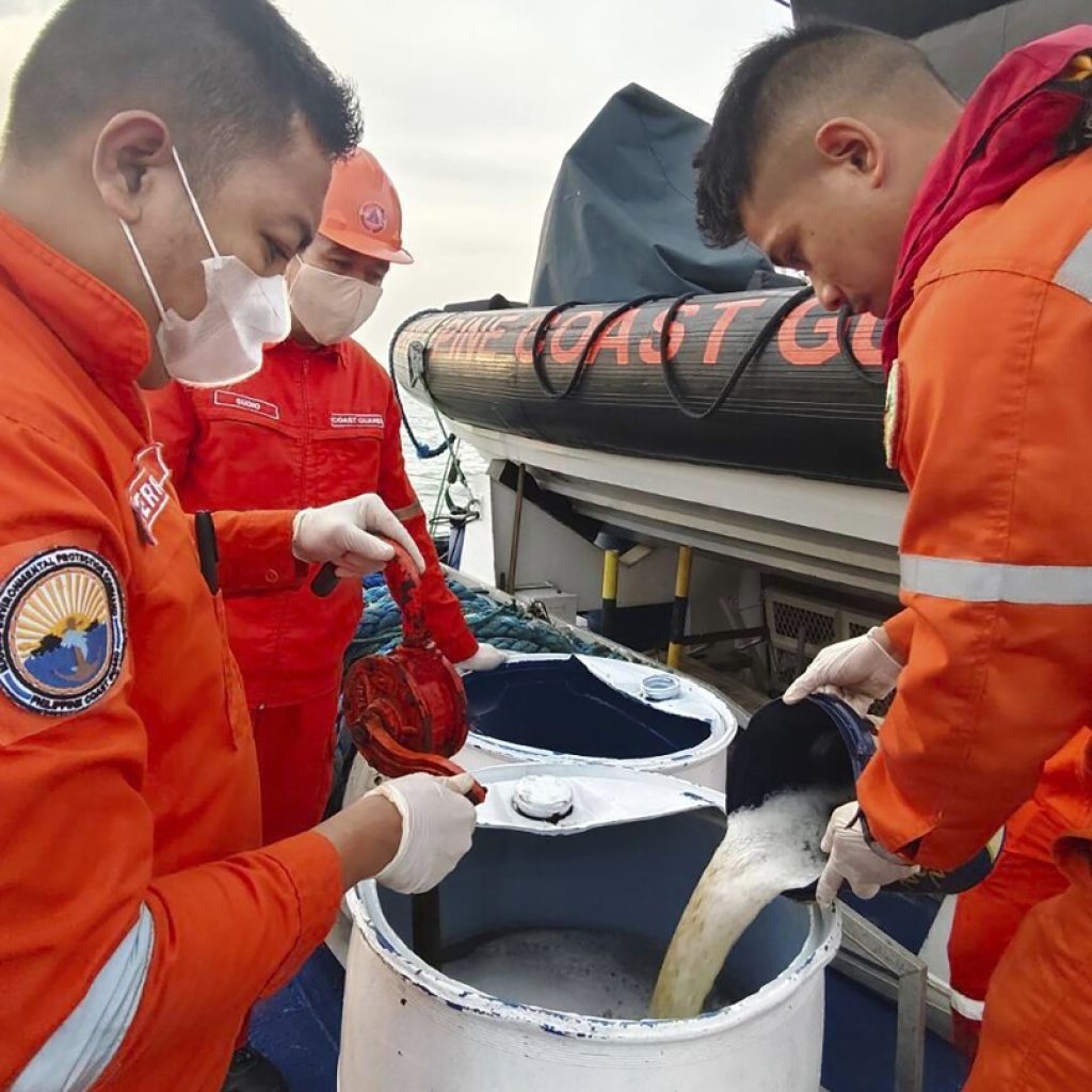 The Philippines says a cargo of oil has started to leak from a tanker that sank in Manila Bay