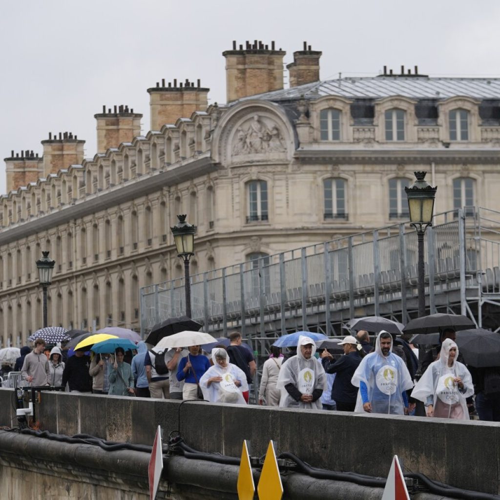 Paris barricades start to come down after opening ceremony on the Seine, but many still struggling