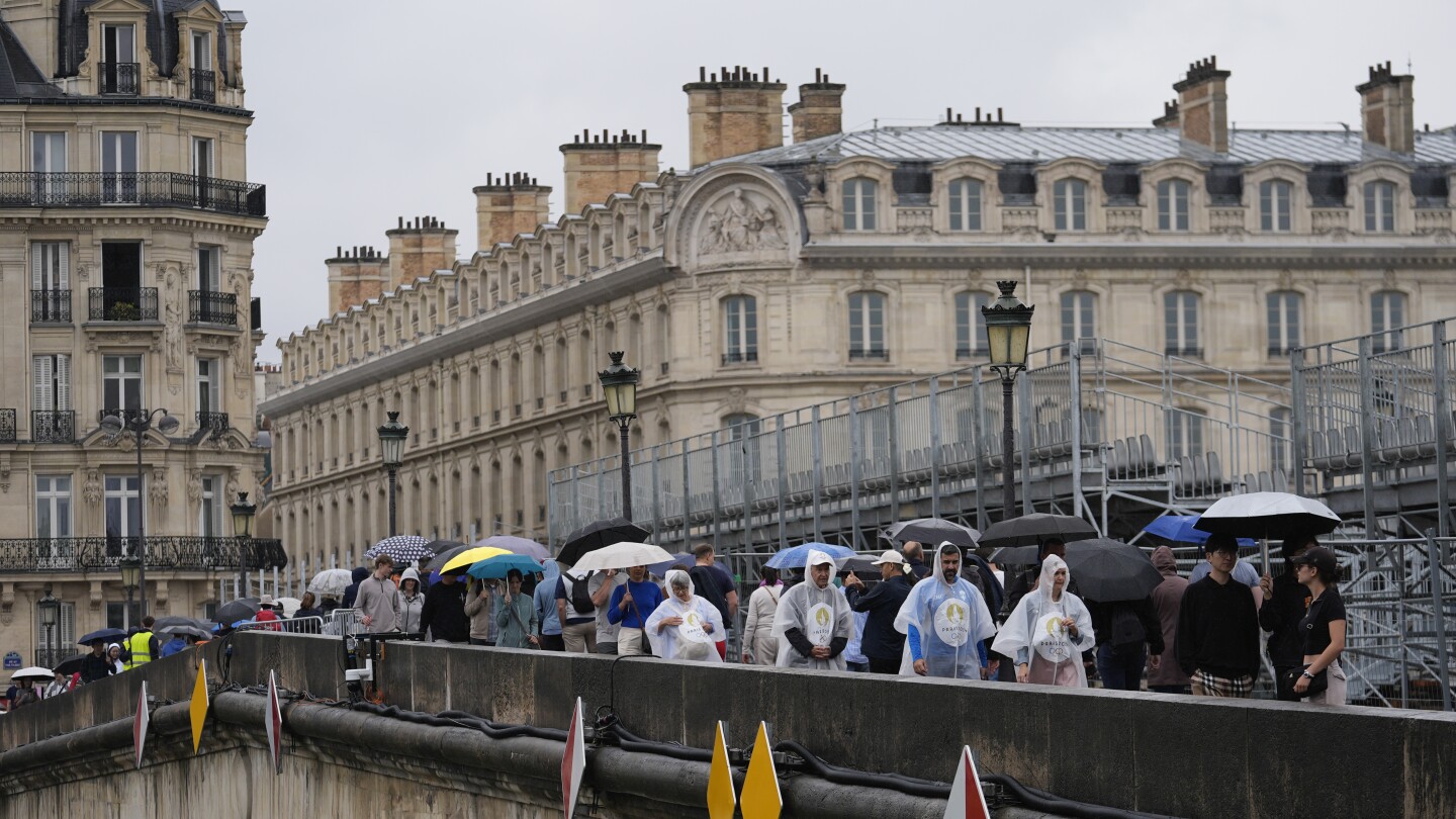 Paris barricades start to come down after opening ceremony on the Seine, but many still struggling