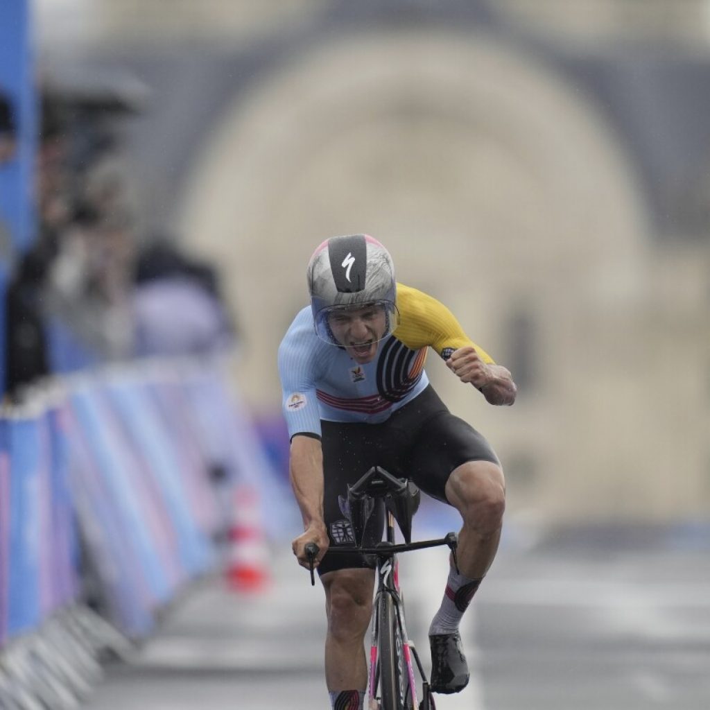 Evenepoel tops Italian rival Ganna, Belgian countryman van Aert to win the Olympic time trial