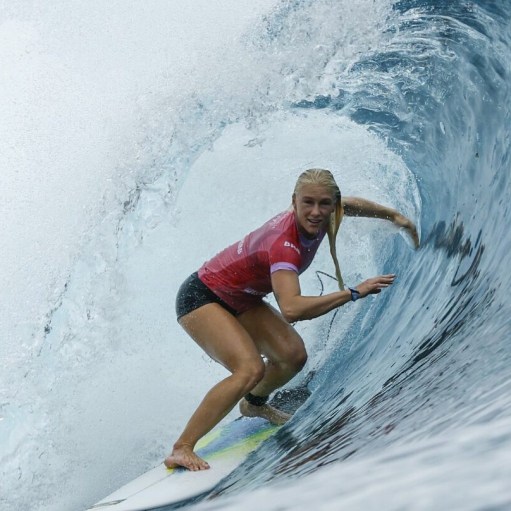 Surf’s up! Paris Olympics surfing competition commences in Tahiti, with wave rides and wipe outs