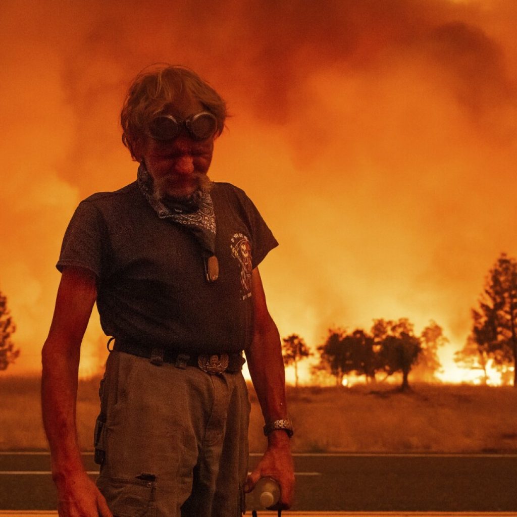 Firefighters helped by cooler weather battle blaze that has scorched area size of Los Angeles