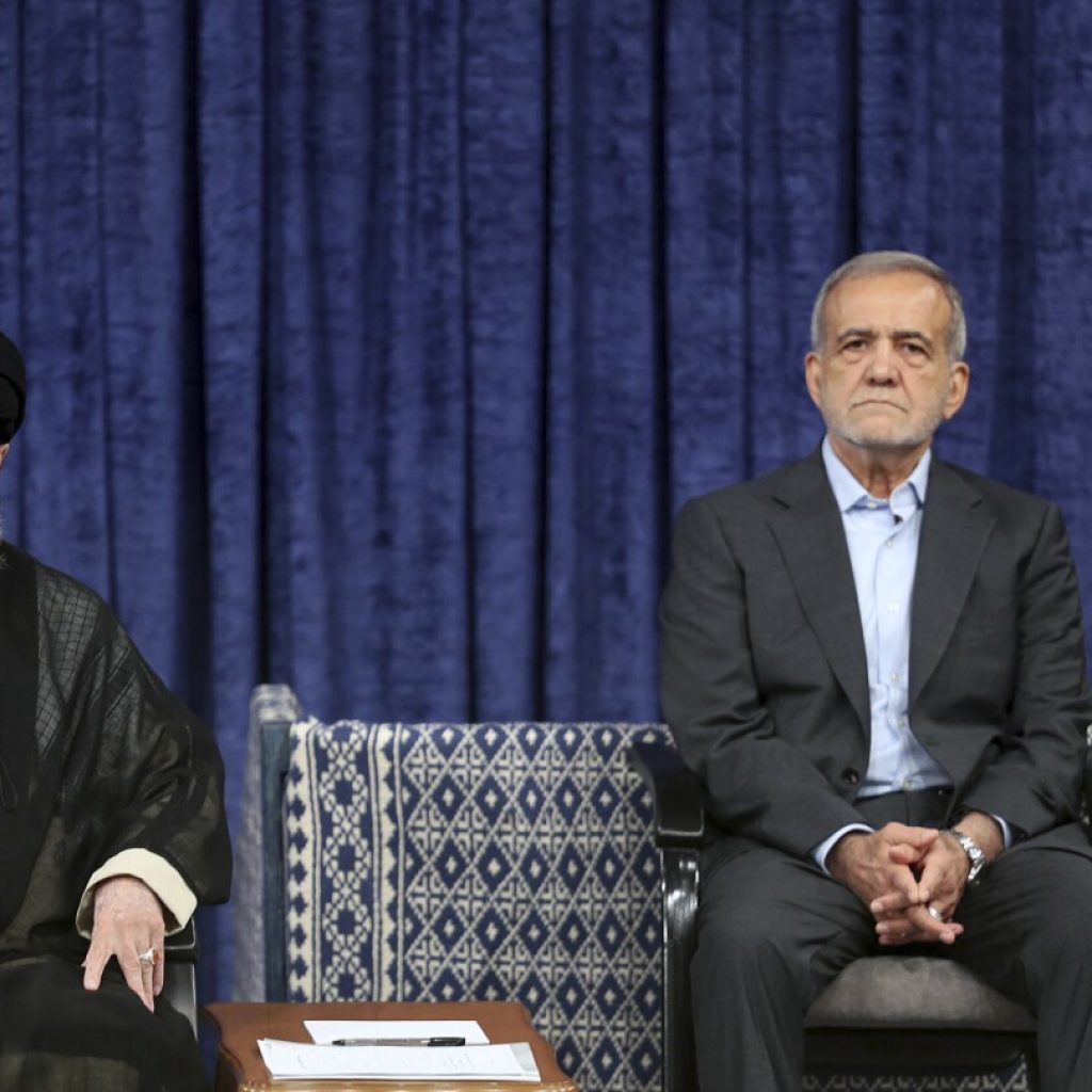 Reformist formally takes over as Iran’s president after supreme leader offers endorsement