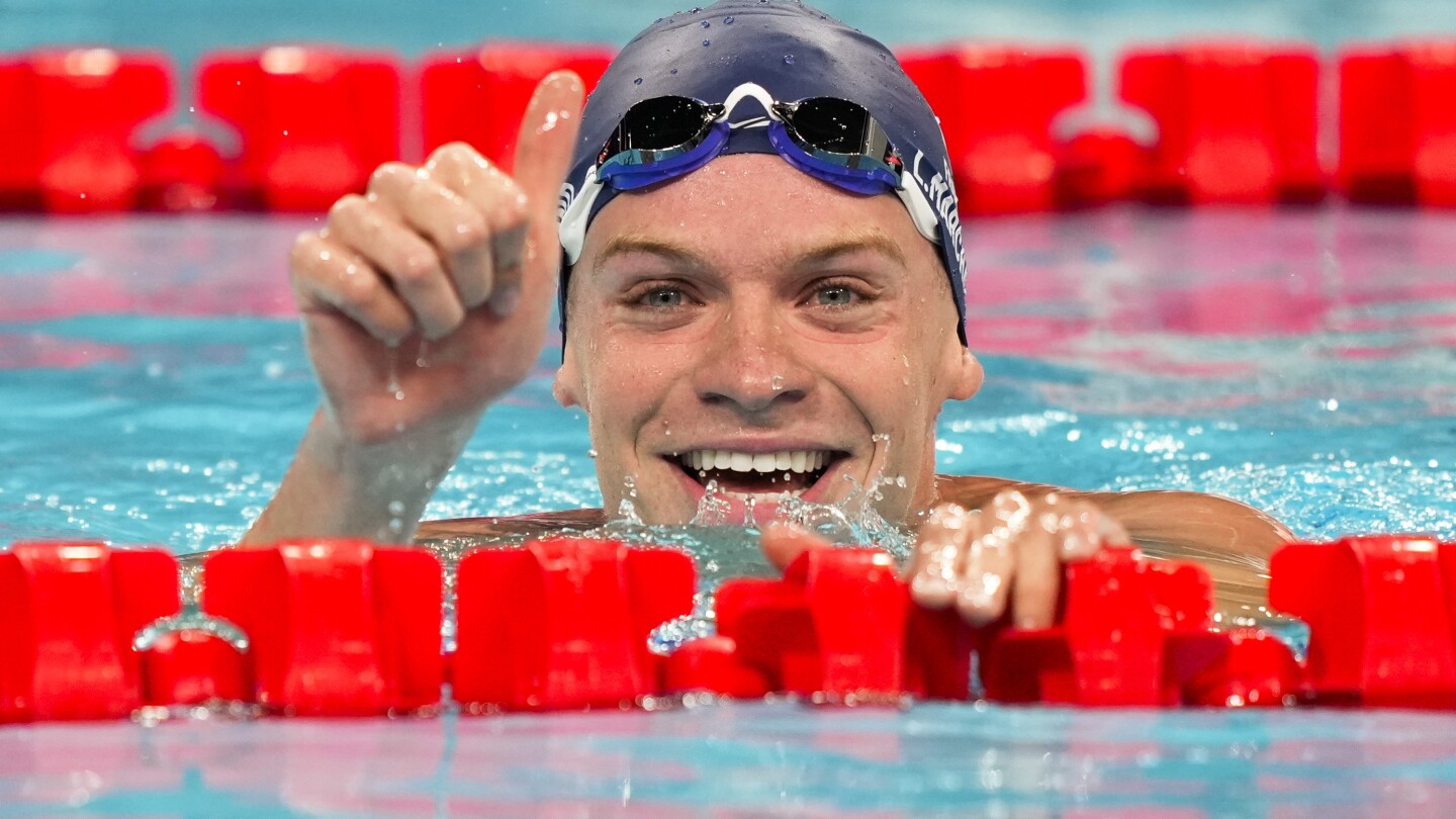 With French fans cheering every stroke, Marchand cruises to fastest time in men’s medley