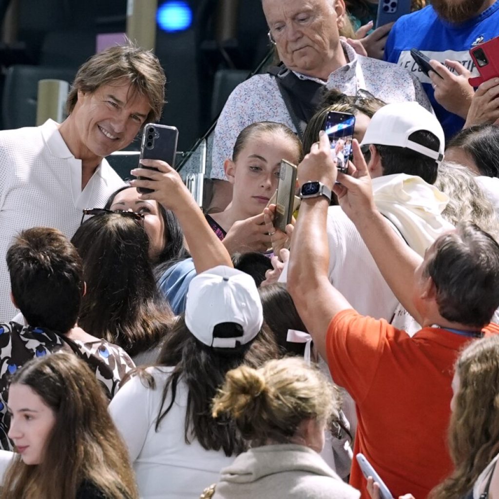 When Biles competes, the show is in the stands too. Tom Cruise, more stars attend her Olympic return