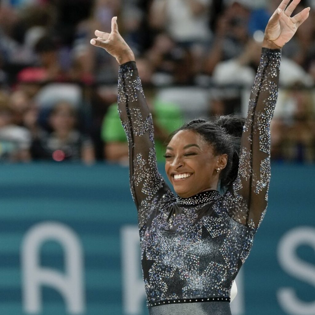 2024 Paris Olympics live updates: Simone Biles leads gymnastics group | AP News