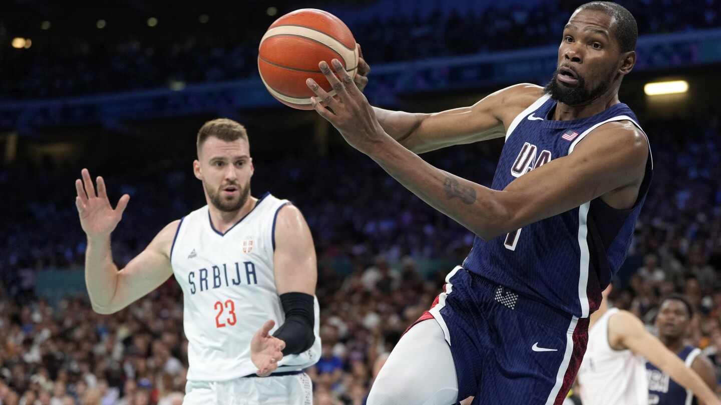 US men’s basketball team rolls past Serbia 110-84 in opening game at the Paris Olympics