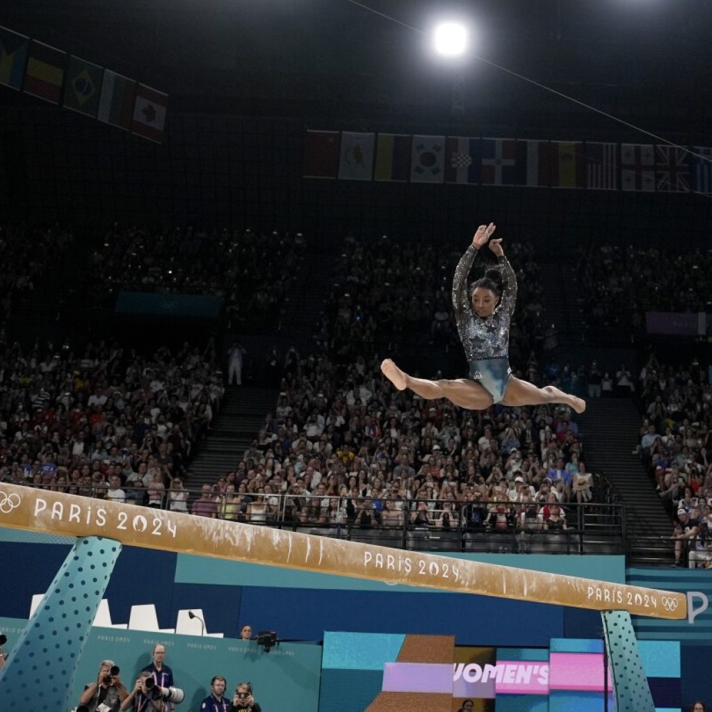 One Extraordinary Photo: Charlie Riedel captures Simone Biles in flight at the Paris Games