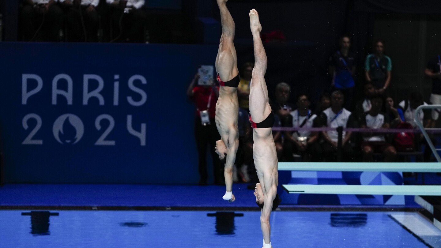 China makes it 2-for-2 in Olympic diving, leaving Britain’s Tom Daley with a silver