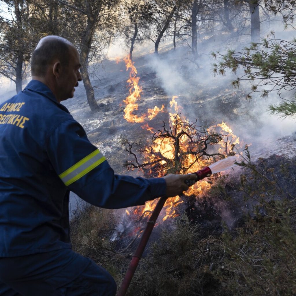 Multiple evacuations ordered in southern Greece as wildfires return to fire-struck island