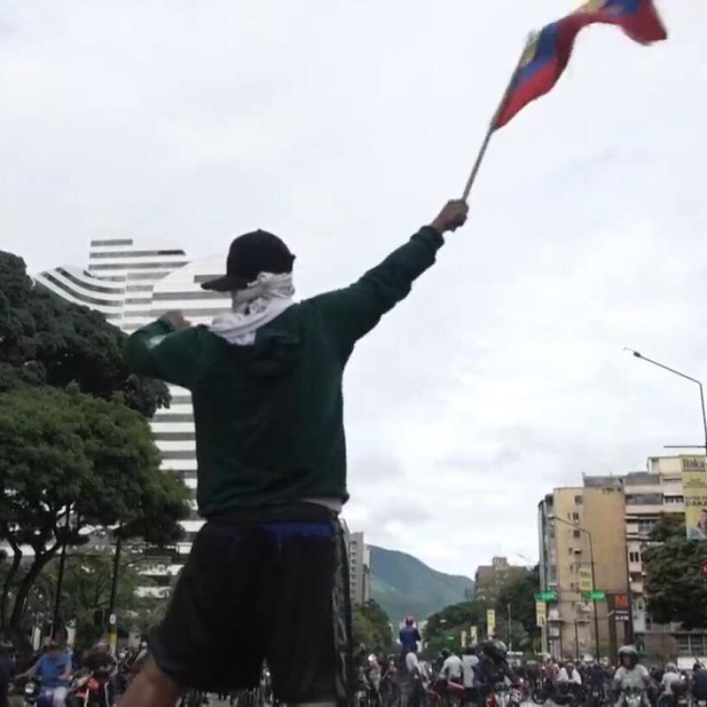 Thousands protest across Venezuela after Nicolás Maduro declared winner in presidential election | AP News