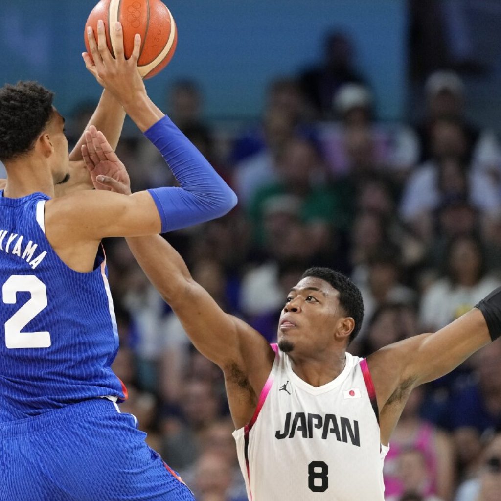 Wembanyama takes over in OT, helps France escape a serious challenge from Japan at the Paris Games